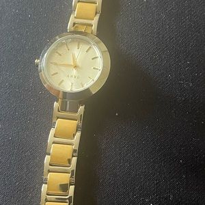 Brand new DKNY watch with tags attached. Only need battery. Never wore.